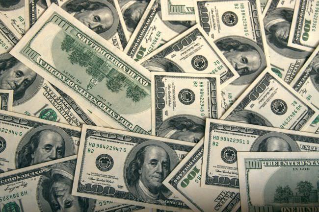 Dólar cai e bolsa no Brasil sobe em dia de posse de Trump