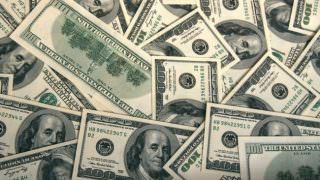 Dólar cai e bolsa no Brasil sobe em dia de posse de Trump