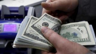 Dólar cai 3,9% e bolsa sobe 1,69% após quinta-feira atribulada