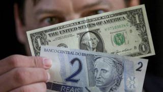 Dólar cai para R$ 6,04 em expectativa com reunião do Copom