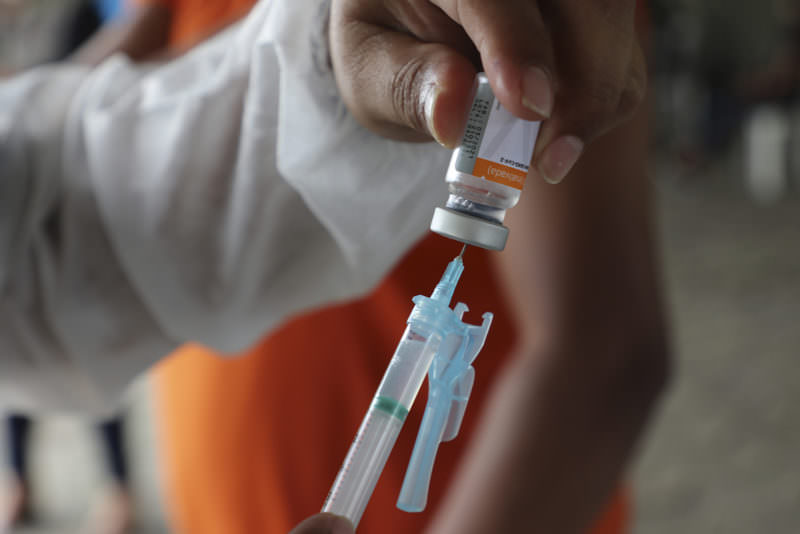doses de vacinas