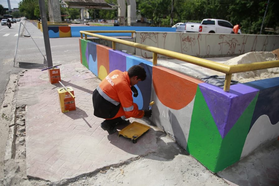 David Almeida - Tintas nos muros do igarapé do Franco