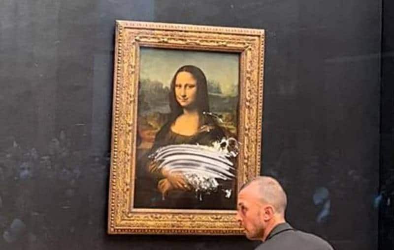 Homem que jogou torta em quadro de Mona Lisa é internado em ala psiquiátrica